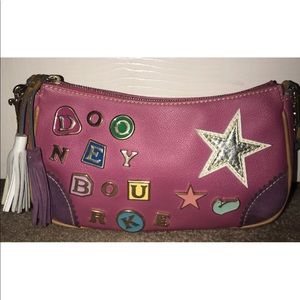Dooney & Bourke pink leather purse/rainbow zipper.